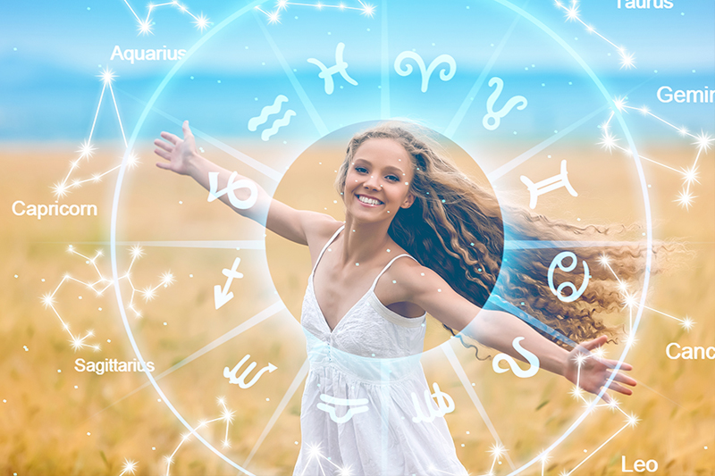 Health Horoscope for the year Horoscope concept. Loving happy couple with zodiac wheel